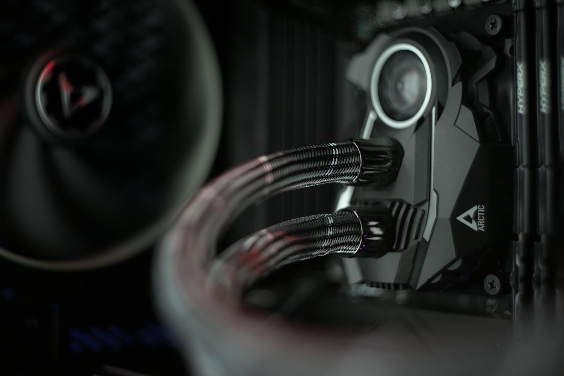 Detailed view of a liquid cooling system inside a desktop computer.