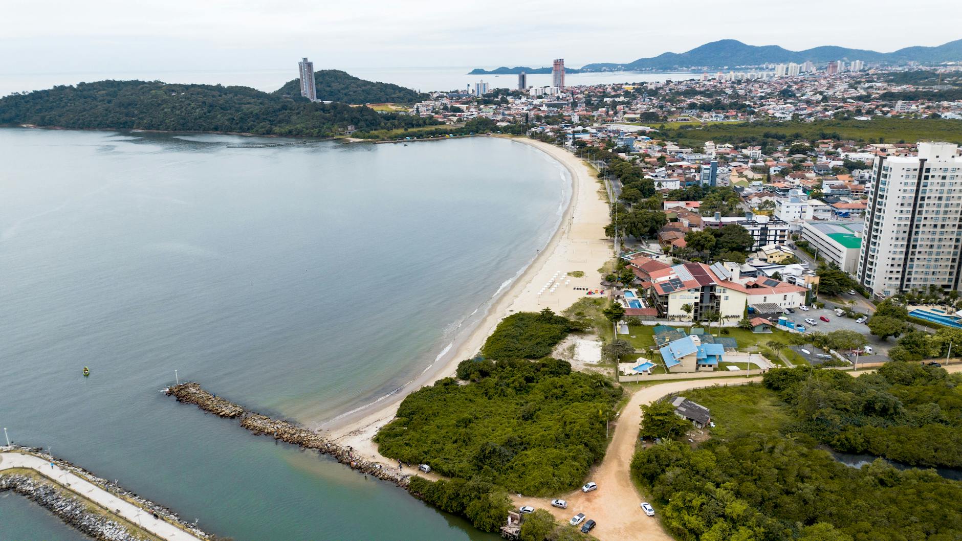 Aerial view of São Francisco do Sul, Brazil, showcasing the coastline and urban landscape.